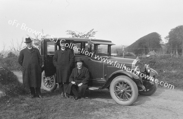 PREISTS WITH MOTOR CAR